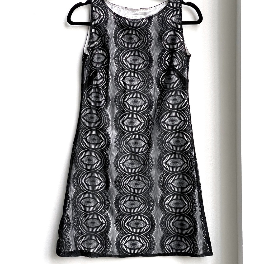 NWOT The CUE CHER QU black lace mini dress with white underlining